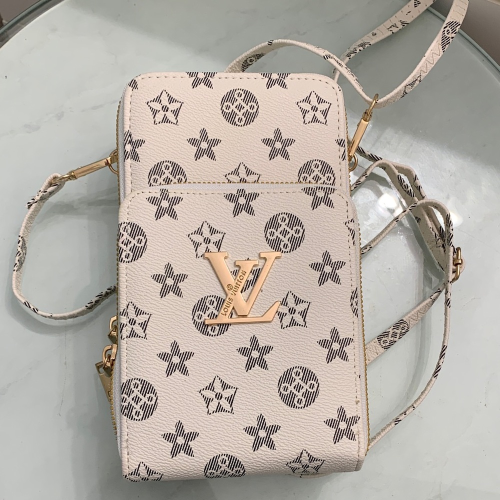 New without tags .Cream and Black Star Pattern Crossbody Bag